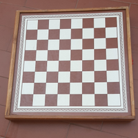 Scacchiera in legno, e pedine per dama