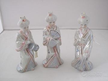 Tris statuine geisha