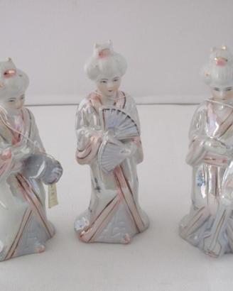 Tris statuine geisha