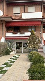Villetta a schiera con giardino privato