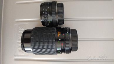 Macchina fotografica praktica e vari teleobiettivi