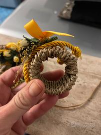 Due portatovaglioli segnaposto e porta candele