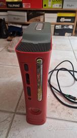 xbox 360 rossa con 2 joystick  e 10 giochi 