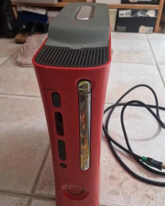 xbox 360 rossa con 2 joystick  e 10 giochi 