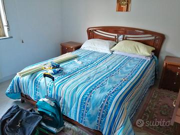 Stanza da letto con carrello tv