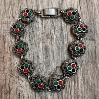 Bracciale floreale in metallo con pietre colorate