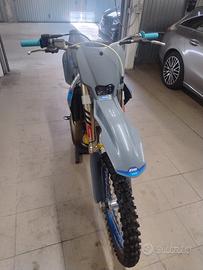 TM 125 