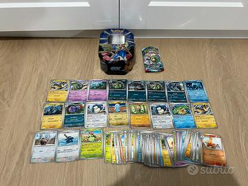 82 carte Pokémon originali + tin da collezione