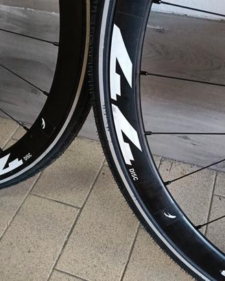 Cerchi alluminio perno passante 12mm freni a disco