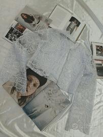 Giacca bianca in pizzo con maniche svasate