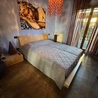 Letto contenitore matrimoniale