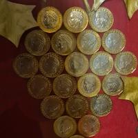 Quadro con monete della vecchia lire