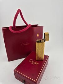 Accendino Cartier, placcato oro.
