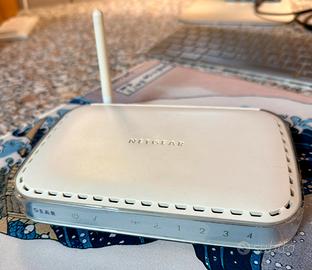 Router + Switch Netgear WGT624 v3