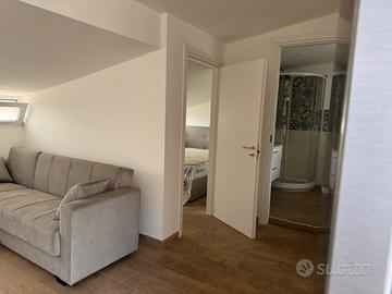 Mansarda arredata con terrazza in pieno centro