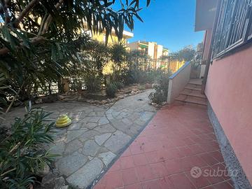 Splendido appartamento con giardino e garage