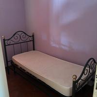 Letto singolo in ferro battuto