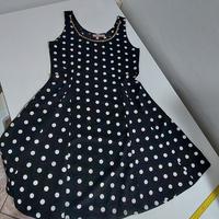 Vestito nero pois bianchi decoro catena