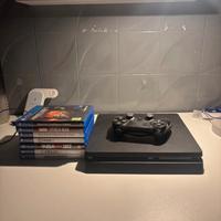 Play station 4 usata da 1 TB, con pad e 7 giochi