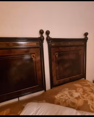 Letto in ferro battuto. 