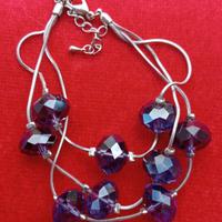 BRACCIALE ACCIAIO E PIETRE AMETISTA 