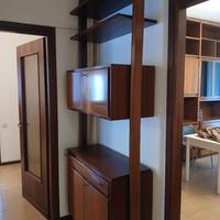 libreria colonna a soffitto anni 70