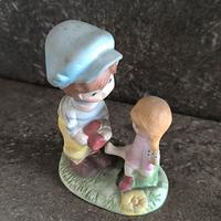 Statuina bimbo e bimba in ceramica 