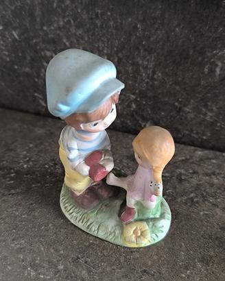 Statuina bimbo e bimba in ceramica 