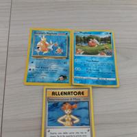 tre carte Pokemon Magikarp e allenatore una brilla