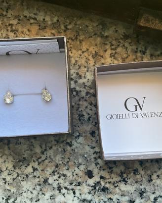 Orecchini punto luce