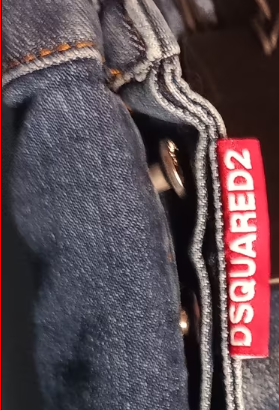 Jeans Dsquared2 con toppe e schizzi di vernice