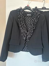 Cannella completo gonna giacca nero e pois