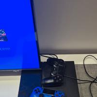  PS4 + due joystick + alcuni giochi