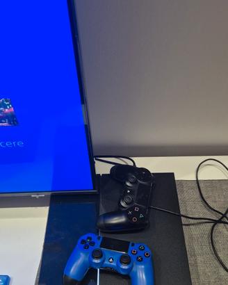  PS4 + due joystick + alcuni giochi