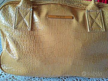 Borsa carpisa effetto pitonata