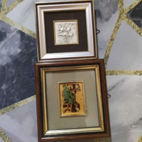 2 quadretti con piastra in argento