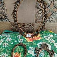 cornici ovali in ottone