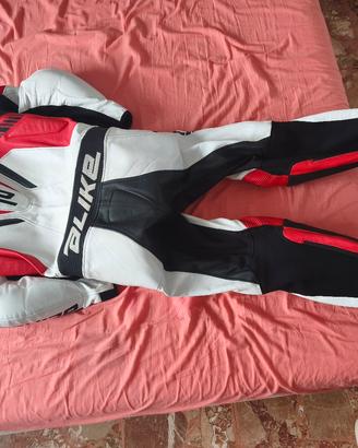 tuta e stivali alpinestars