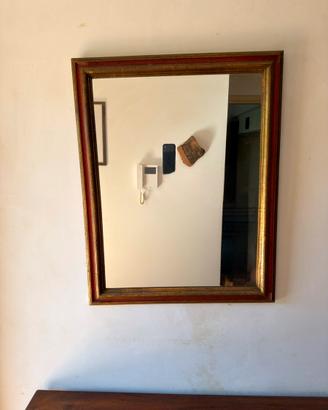 Specchio con cornice di legno