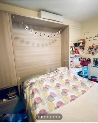 Letto matrimoniale in legno a scomparsa