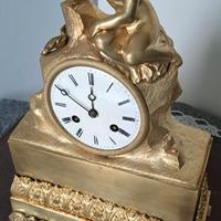 orologio parigina in bronzo dorato