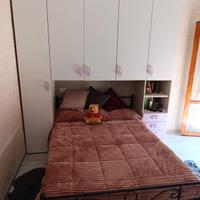 cameretta lilla e bianca 