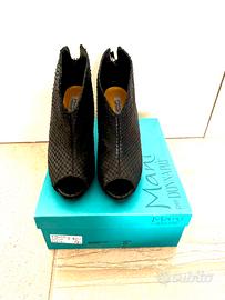 Tronchetti spuntati in pelle Manì