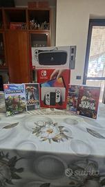 Nintendo switch oled + 4 giochi