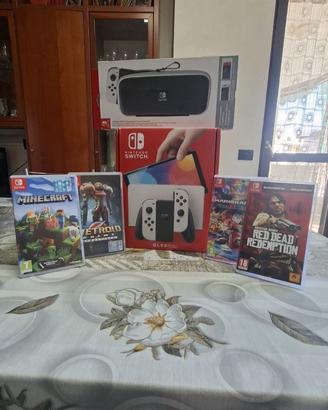 Nintendo switch oled + 4 giochi
