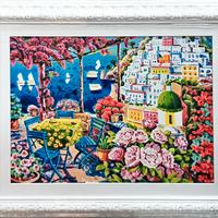 Le sedie azzurre nella luce di Positano Faccincani