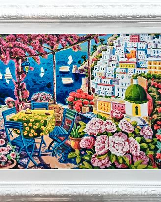 Le sedie azzurre nella luce di Positano Faccincani