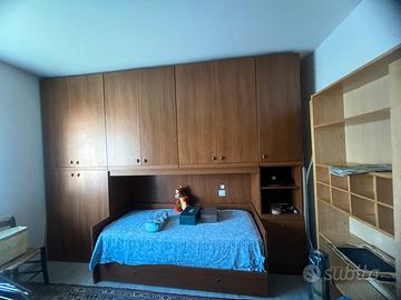 Camera con armadio a ponte