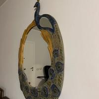 Specchio decorativo con cornice a pavone in legno