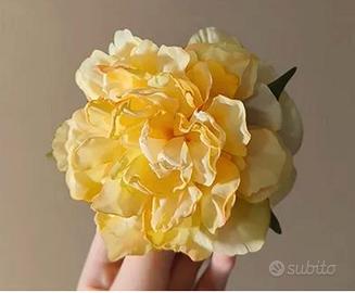 Mollettone capelli con fiore giallo